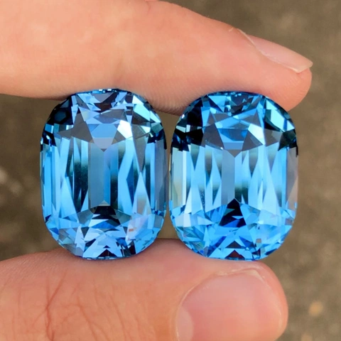 TOP CUT - 108.93Ct ELECTRIC BLUE TOPAZ PAIR-BRAZIL